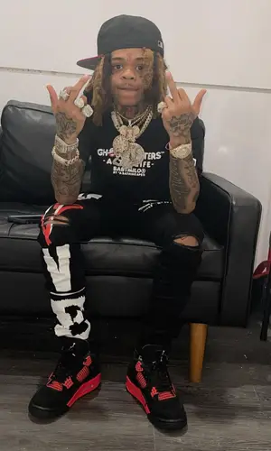 SpotemGottem wearing Love Apparel jeans