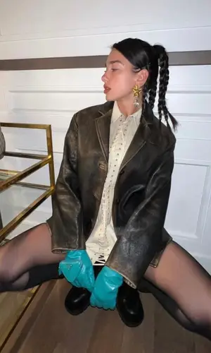 Dua Lipa wearing Bottega Veneta boots