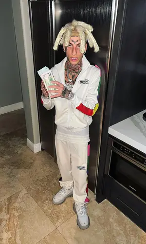 Kodiyakredd wearing Palm Angels jacket