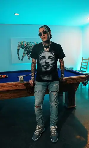 Lil Skies’ Outfit in Amiri Jeans, Jordan Sneakers & Cartier Eyewear (2022)