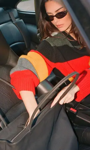 Kendall Jenner’s Outfit in Khaite Sweater & The Row Bag (2022)