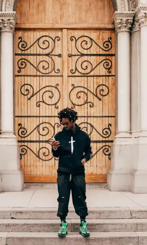 Saint JHN’s Outfit in Christian Sex Club Hoodie, Pyer Moss Pants & Louis Vuitton Sneakers (2022)