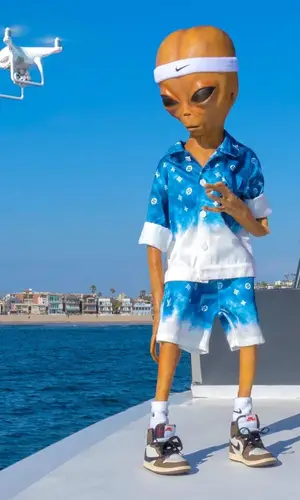 Lil Mayo wearing Nike sneakers