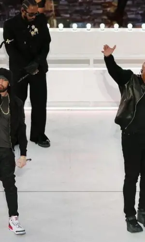 Dr. Dre wearing Amiri jeans