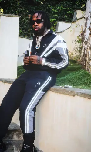 EST Gee wearing Versace eyewear