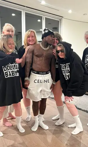 DaBaby wearing Celine shorts