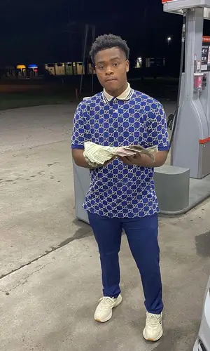 BiC Fizzle wearing Gucci shirt