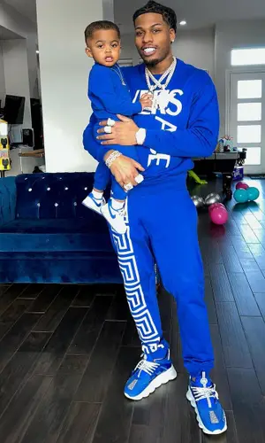 CJ So Cool wearing Versace pants