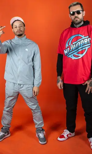 Adam22 wearing No Jumper Merch t-shirt