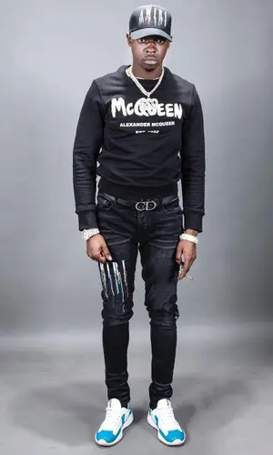 Bobby Shmurda wearing Alexander McQueen sweater
