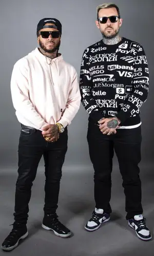 Adam22 wearing Nothing Personal sweater