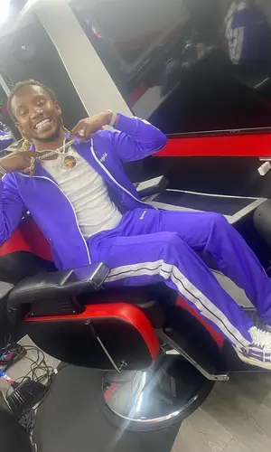100k Track wearing Palm Angels pants