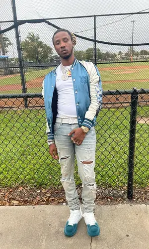 100k Track wearing Versace other