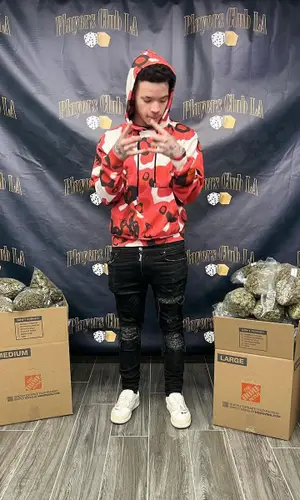Lil Mosey wearing Amiri jeans