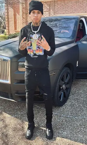 NLE Choppa wearing NLE Choppa Merch hoody