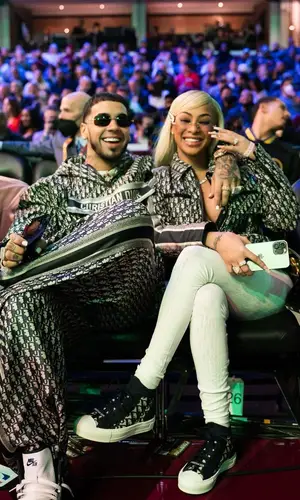 Anuel AA wearing Dior jacket