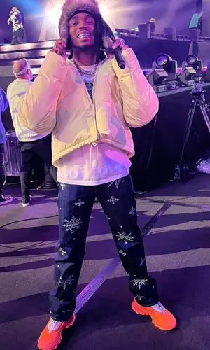 Quavo wearing Adidas boots