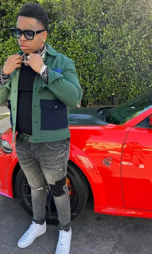 Lil Gotit wearing Zara jacket
