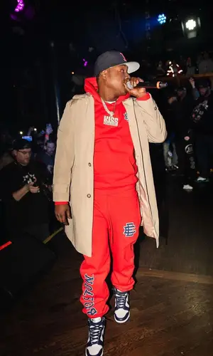 Jadakiss wearing New Era cap