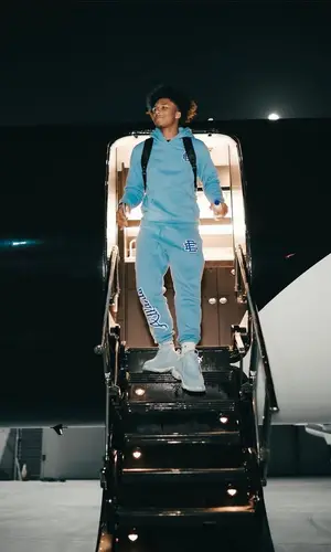 Mikey’s Outfit in Eric Emanuel Pants, Balenciaga Sneakers & Puma Socks (2022)