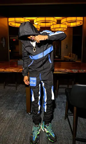 TJ Porter wearing Balenciaga sneakers