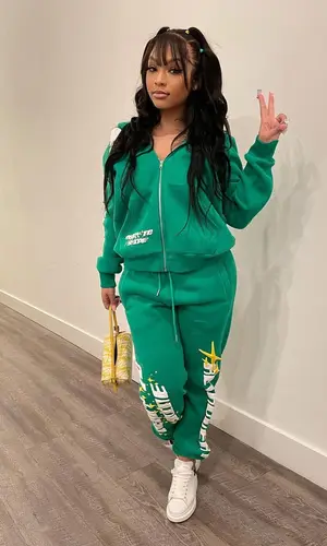 Cuban Doll wearing Retrovert hoody