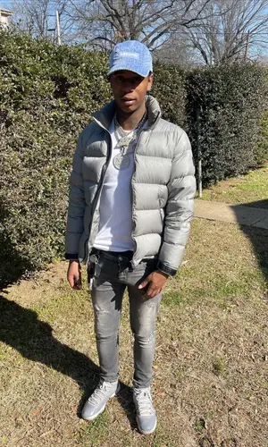 Big Scarr wearing Mackage jacket