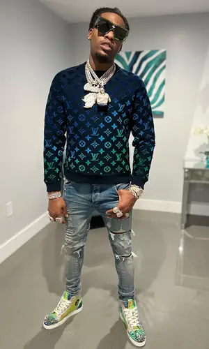 CJ So Cool wearing Louis Vuitton eyewear