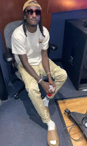 K Camp wearing Mastermind pants