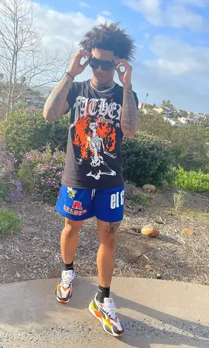 Mikey wearing Puma sneakers