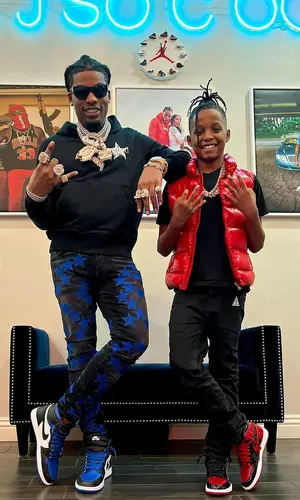 CJ So Cool wearing Amiri hoody