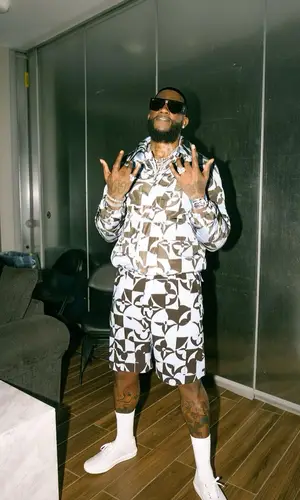 Gucci Mane wearing Louis Vuitton jacket