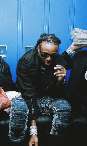 Quavo wearing Balenciaga boots