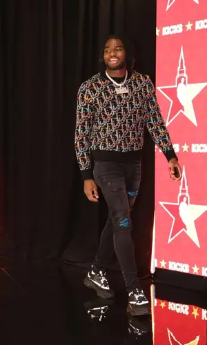 Isaiah Simmons wearing Dior sweater