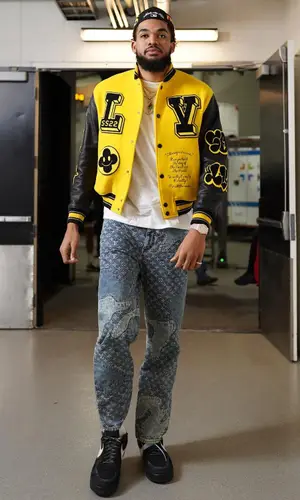 Karl Anthony Towns’ Outfit in Louis Vuitton Pants, Off-White Sneakers & Nigo (2022)