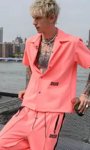 Machine Gun Kelly wearing Bossi shirt
