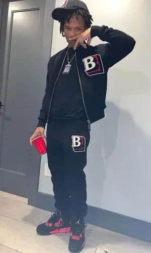 B Lovee wearing Burberry jacket