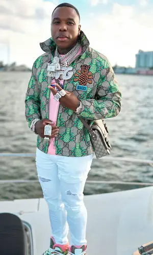 BandMan Kevo wearing Amiri jeans