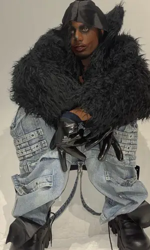 Playboi Carti’s Outfit in Balenciaga Jacket & Wells Lamont Gloves (2022)