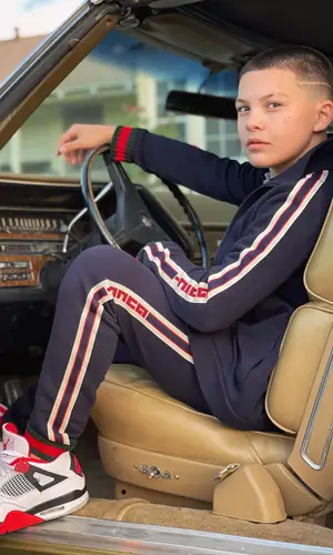 Javon Walton wearing Gucci jacket