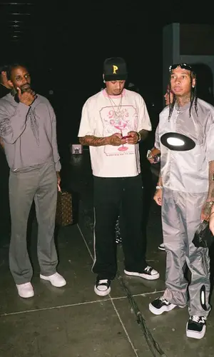 Tyga wearing Code shirt