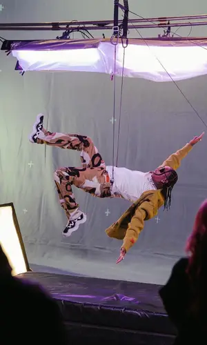 Tyga wearing Heron Preston jeans