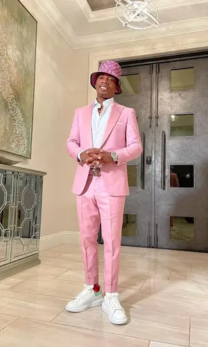 Plies wearing Dolce & Gabbana suit