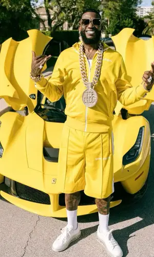 Gucci Mane’s Outfit in Palm Angels Jacket, Alexander McQueen Sneakers & Cartier Eyewear (2022)