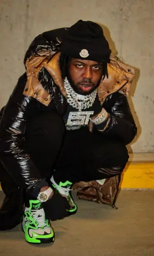 EST Gee wearing Moncler hat