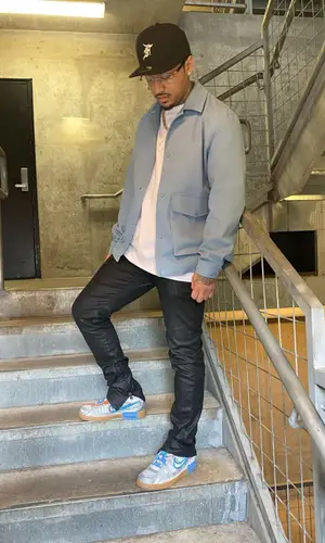 Kirko Bangz wearing Fear of God cap