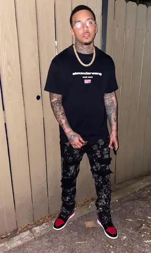 Kirko Bangz wearing Nike sneakers