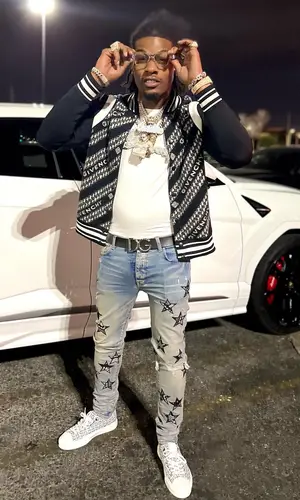 CJ So Cool wearing Dolce & Gabbana belt