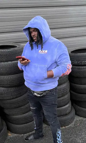 Tee Grizzley wearing Fendi sandal