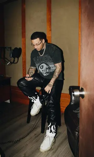 Kirko Bangz wearing Balenciaga sneakers